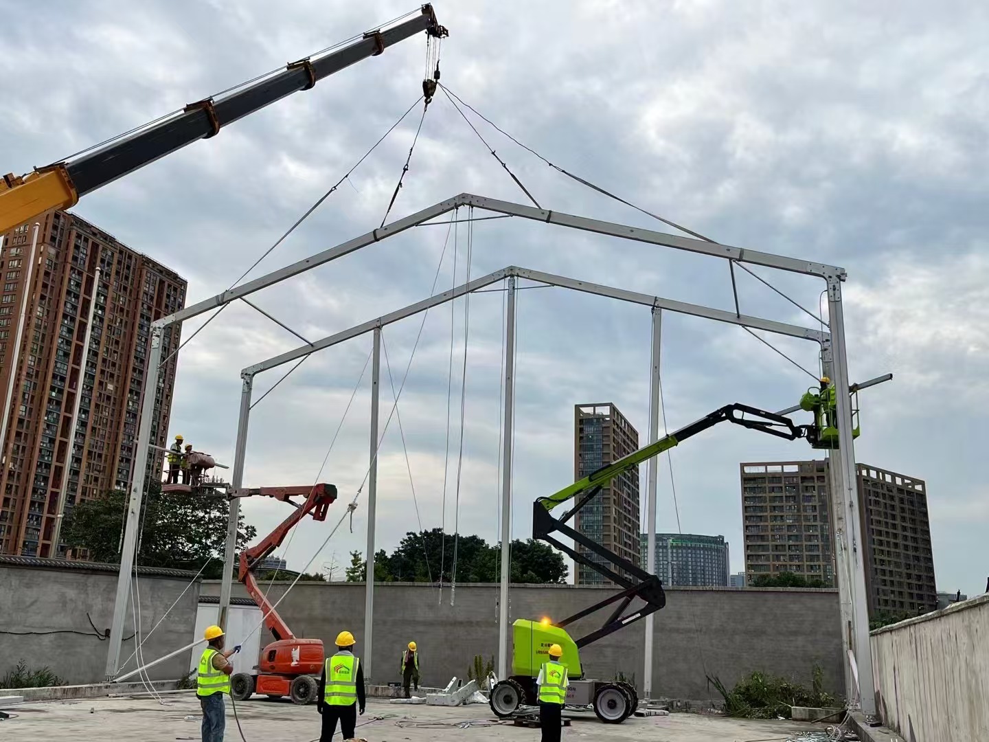 White tent structure covering a tennis court