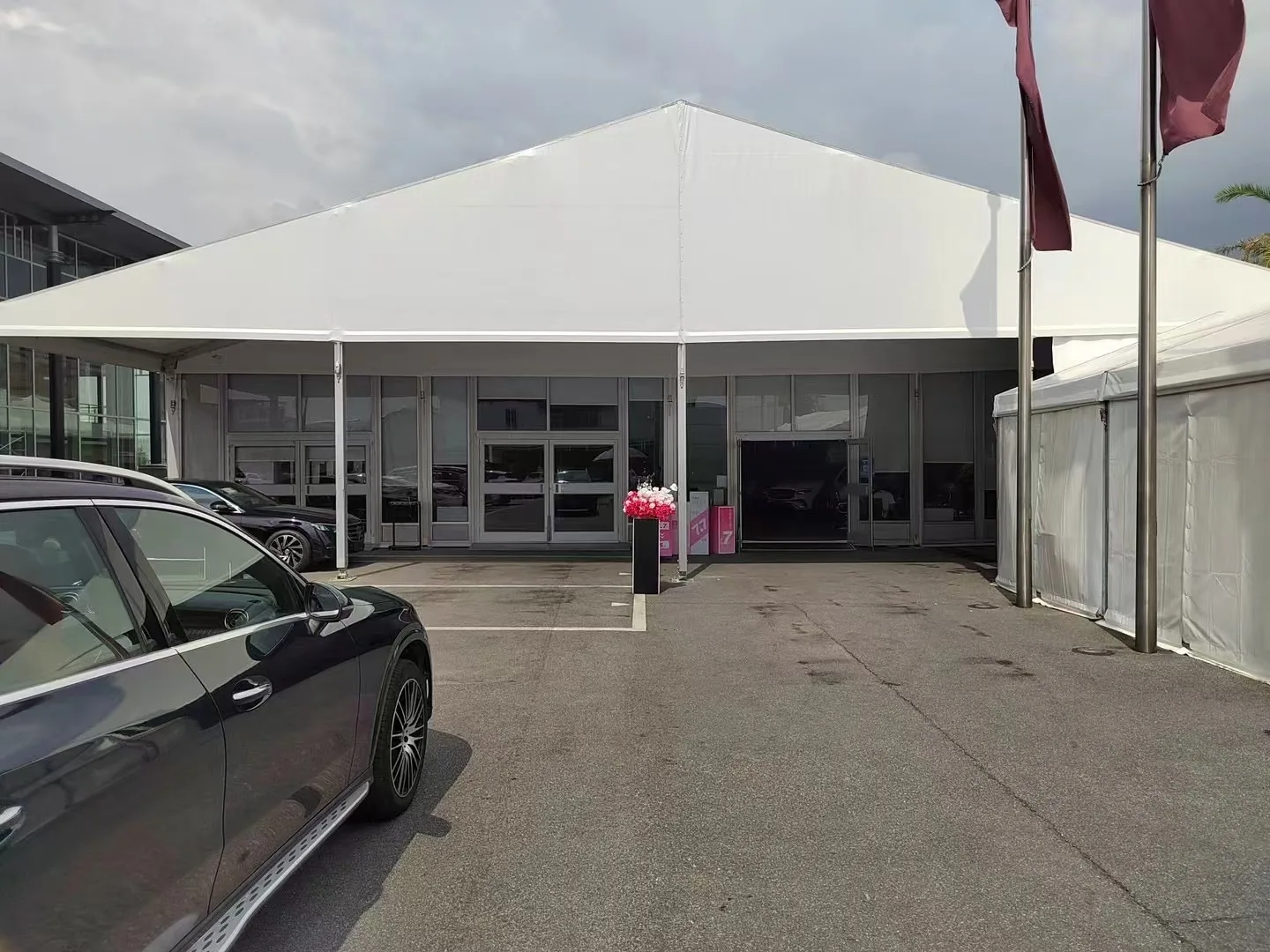 Vehicles displayed inside the Suzhou auto show tent